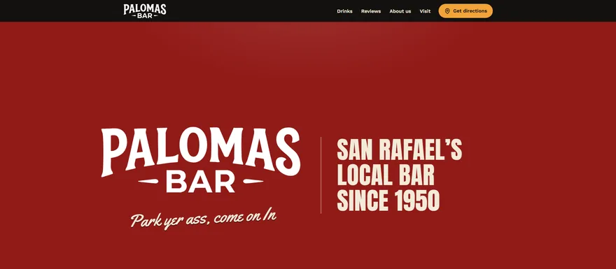 The Palomas Bar home page: the white Palomas Bar logo on deep red, the handwritten line Park yer ass come on In, and the heading San Rafael's local bar since 1950.